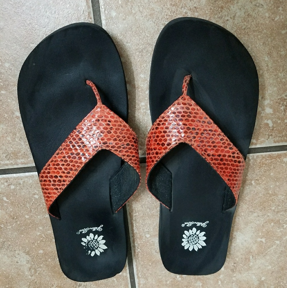 Yellow box flip flops
